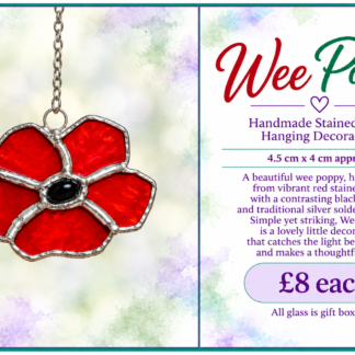 Wee Poppy handmade red stained glass hanging decoration with black centre by Stramash Creations.